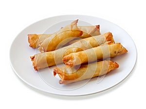 fried spring rolls on a white plate