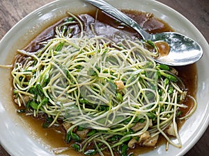 Fried sunflower sprouts with oyster sauce