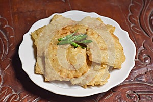 fried tempeh with cayenne pepper on a plate