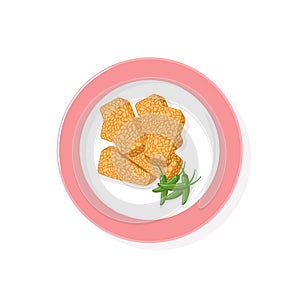 Fried tempeh with chili on a plate. isolated on a white background. Vegan organic fermented soybeans. Tradi