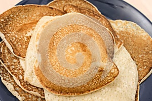Fried thin pancakes made from wheat flour close up Photo
