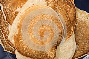 Fried thin pancakes made from wheat flour close up Photo