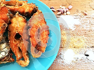Fried tilapia fish on dish