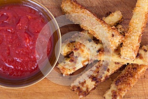 Fried tofu sticks with marinara dip