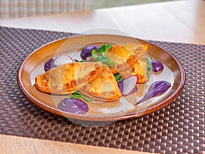 Fried traditional Liptov dumplings with red cabbage puree