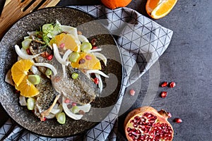 Fried trout fillets with salad