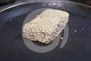 Fried tuna steak on the hot pan