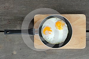 Fried twin eggs with pan