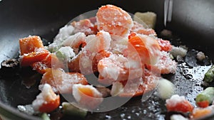 Fried vegetables in a frying pan