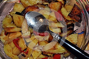 Fried vegetables, potatoe and meal food