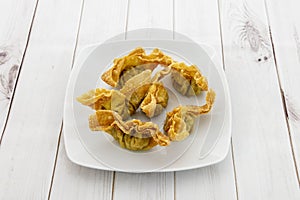 The fried wantan, also called wontun or wonton, is a Chinese dumpling photo