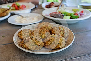 Fried zucchini balls plate in the greek tavern.