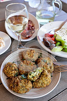 Fried zucchini balls plate in the greek tavern.