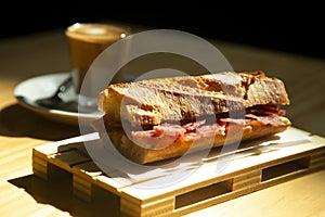 Fuet sandwich in a Spanish restaurant at breakfast time. photo