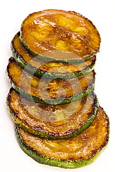 Fried zucchini. Isolated vegetables.