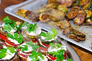 Fried zucchini stacked and served with fresh parsley