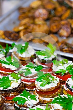 Fried zucchini stacked and served with fresh parsley