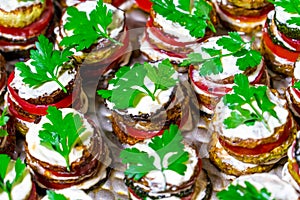 Fried zucchini stacked and served with fresh parsley