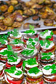 Fried zucchini stacked and served with fresh parsley