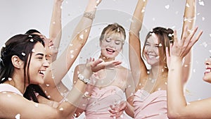 Friend, bridal party and dancing for wedding celebration in studio with happiness and event with excitement. Young