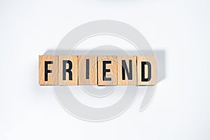 ` FRIEND ` text made of wooden cube on  White background