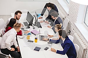 Friendly business team in boardroom