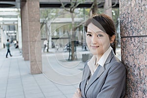 Friendly business woman of Asian with copyspace