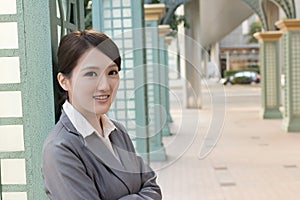 Friendly business woman of Asian with copyspace