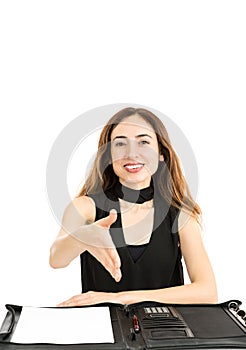 Friendly business woman reaching out her hand for hand shake