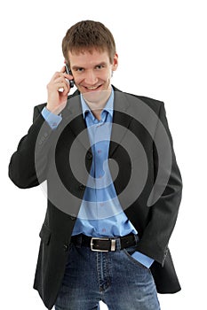 The friendly businessman speaks by phone