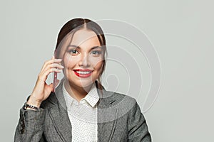 Friendly businesswoman phone on white background