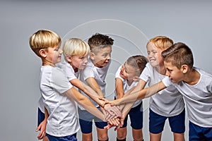 friendly children soccer team getting ready to play