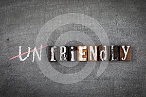 Friendly concept. Text on a dark chalk board