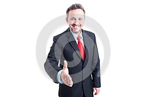 Friendly and confident business man ready for hand shake