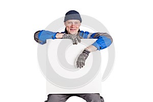 Friendly construction worker holding a blank, white sign. Isolated on white