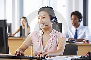 Friendly Customer Service Agent In Call Centre photo