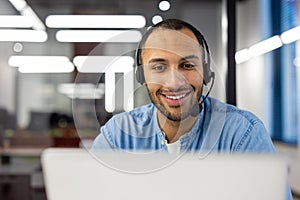 Friendly customer service agent working in modern office