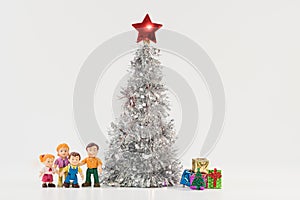 Friendly doll family and a lush silver Christmas tree, surprise gift boxes by the festive tree