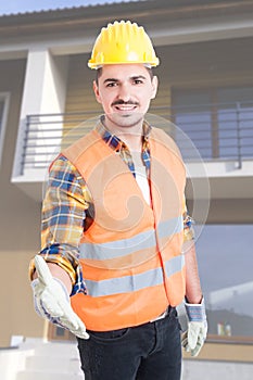 Friendly engineer or architect doing handshake gesture