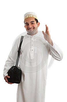 Friendly ethnic man waving photo