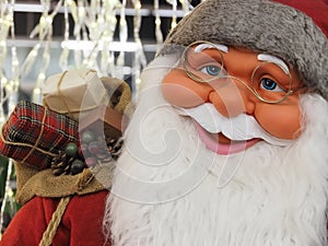 Friendly Face of Santa claus with blue eyes and a white beard