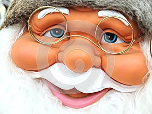 Friendly Face of Santa claus with blue eyes and a white beard