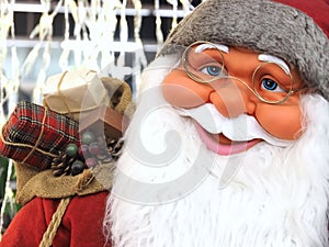 Friendly Face of Santa claus with blue eyes and a white beard