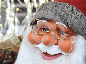 Friendly Face of Santa claus with blue eyes and a white beard