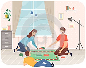 Friendly family playing board game. Parents with kid having fun, spending time together at home