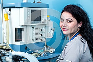 Friendly female anesthesiologist portrait in the operating room.