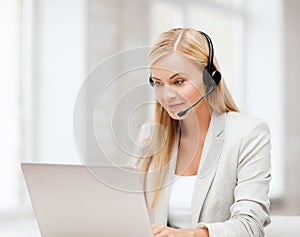 Friendly female helpline operator photo