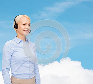 Friendly female helpline operator with headphones