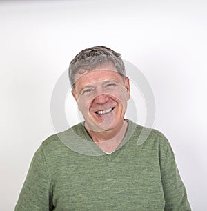 Friendly happy laughing mature man