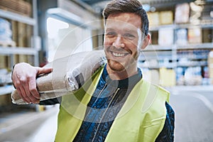 Friendly happy warehouse worker